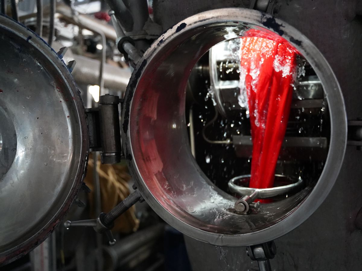 Fabric being dyed in a dyeing machine